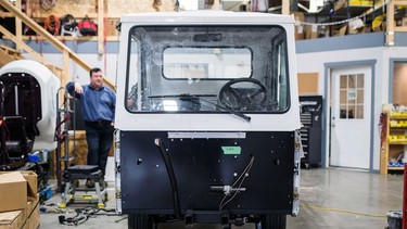 An electric truck sits on the assembly floor inside the Canadian Electric Vehicles Ltd. manufacturing facility in Parksville, British Columbia.