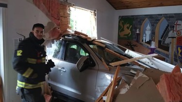 SUV crashes into Kingston Parish Hall 2