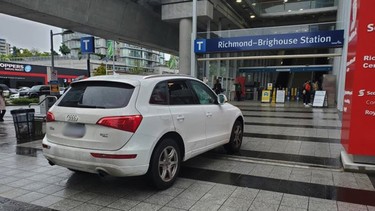 Vancouver motorist parks on sidewalk at skytrain station