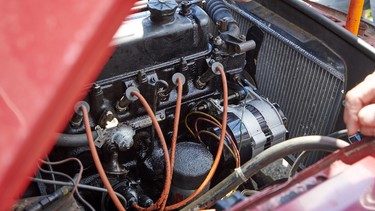 The MGB's oily engine bay