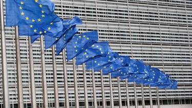 European Union flags flutter outside the E.U. Commission headquarters in Brussels, Belgium, July 14, 2021.