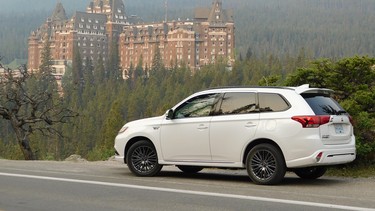 The 2022 Mitsubishi Outlander 2022 with the iconic Banff Springs Hotel — dubbed the 'Castle in the Rockies' — in the background.