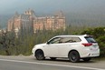 The 2022 Mitsubishi Outlander 2022 with the iconic Banff Springs Hotel — dubbed the 'Castle in the Rockies' — in the background.