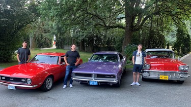 High school car buddies (left to right) Mateo Cecchinia, Marc Testa and Matthew Marsolais help each other restore their collector cars, respectively, a 1968 Chevrolet Camaro, a 1969 Dodge Charger, and a 1958 Pontiac Laurentian.