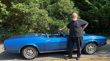 Dave Mitchell with the 1973 Mustang convertible he bought in California to commemorate the Insurance Corporation of British Columbia’s 25th anniversary.