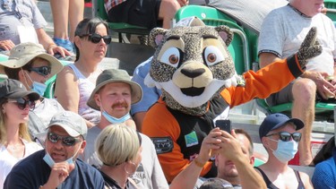 A mascot has fun with the enthusiastic crowd at the Grand Prix de Trois-Rivières.