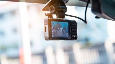 Car video camera attached to the windshield to record driving and prevent danger from driving