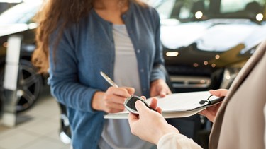 Receiving the key to a rental car