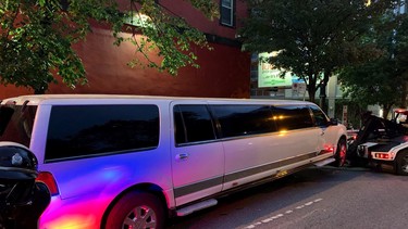 Stretched limo being towed for safety violations