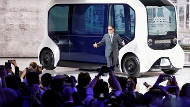 Toyota Motor Corporation President Akio Toyoda, shows the e-Palette autonomous concept vehicle at the Tokyo Motor Show, in Tokyo, Japan October 23, 2019.