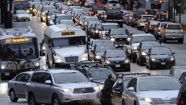 January 29, 2014:    Just another night for rush hour as hundreds of cars make their way north along downtown Vancouver's Georgia street
