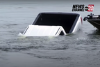 Watch: News reporter accidentally catches GMC Sierra sinking into a lake