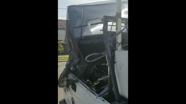 A load of appliances secured in a truck bed by electrical tape, as captured on film by a police officer in Milton, Ontario in August 2021