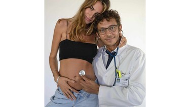 The pregnancy announcement photo of motorcycle racer Valentino Rossi and wife Francesca Sofia Novello