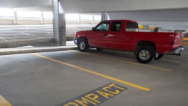 A pickup truck can be seen occupying a spot in a parkade off of Rose Street in downtown Regina on Aug. 6, 2021.