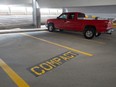 A pickup truck can be seen occupying a spot in a parkade off of Rose Street in downtown Regina on Aug. 6, 2021.