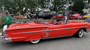 The Rio Red 1958 Chevrolet Impala — just one of many, many sweet collector and classic cars at the show —  has all the extras.