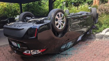 A flipper-over SUV in Vancouver, the result of a crash caused by a spider in the car