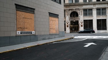 Few people walk through the streets of downtown Atlanta where tourism and businesses have been hard hit by coronavirus (COVID-19) on December 07, 2020 in Atlanta, Georgia.