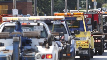 An August 2015 file photo of tow trucks in Ottawa.