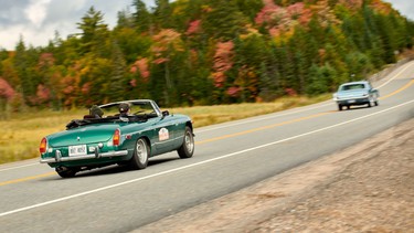 Matt Bartlett in his 1973 MGB, and Hilary Riem in her father Justin's 1966 Ford Mustang