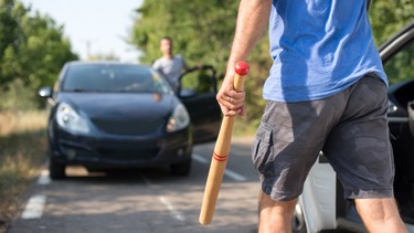 aggressive drivers attacked each other with weapons in traffic