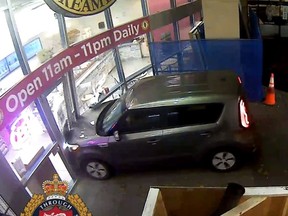 A Kia crashing into the front of an ice cream shop in Victoria, B.C.