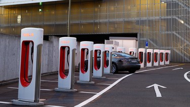 Tesla Supercharger stations are seen at a motorway service area near Affoltern am Albis, Switzerland October 20, 2021.