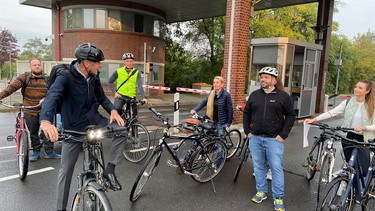 VW CEO Herbert Diess, left, on October 6 tweeted this picture of himself with German bicylists.