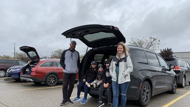 Veronica Jenik (right) and husband Dan (left) are the parents of two hockey & baseball rep players, with their youngest developing into a prodigy, and their trusty Chrysler Pacifica (nicknamed Darth Vader) has room for all the gear and the kids to travel in sinister style.