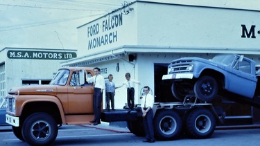The Friesen brothers with a load of 1963 Ford trucks being delivered to their father’s dealership.