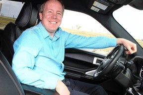 Wayne in the driver’s eat of his Explorer.