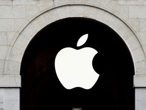 Apple logo is seen on the Apple store at The Marche Saint Germain in Paris, France July 15, 2020.