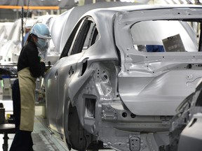 A worker at Toyota's Takaoka Plant in Japan