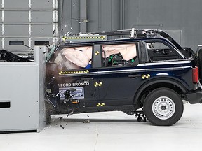 The 2021 Ford Bronco undergoing an IIHS small-overlap crash test