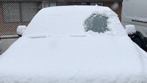 Snow-covered windshield stopped in Durham, Ontario
