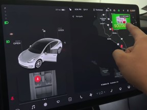 An in-car video game on the infotainment screen of a Tesla