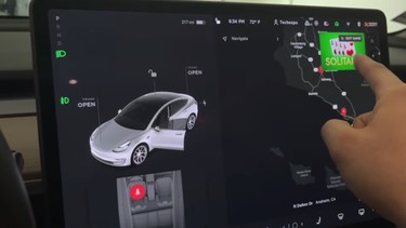 An in-car video game on the infotainment screen of a Tesla