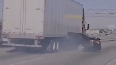 Watch- Semi truck drags Honda Accord stuck beneath as driver waves to passing traffic