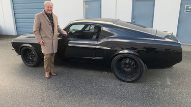 Vancouver collector car dealer Wayne Darby with a hot Mustang – one of the 42 classics he sent to the Barrett-Jackson Auction in Scottsdale, Arizona.