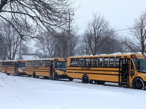 Perth County council has directed staff to research the potential for installing stop-arm camera on area school buses to capture images of vehicles that pass school buses while they’re stopped dropping off or picking up students. Pictured, school buses wait to pick up students at St. Aloysius Catholic Elementary School in Stratford Thursday afternoon. (Galen Simmons/The Beacon Herald)