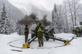Gunners from the 1st Regiment, Royal Canadian Horse Artillery fire a 105mm C3 Howitzer gun as part of Operation Palaci to clear snow pack in danger of avalanche at Rogers Pass, British Columbia, Canada November 22, 2018. Picture taken November 22, 2018.