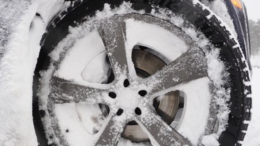 A winter tire on a Porsche Macan