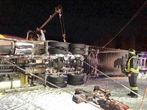 A tractor trailer carrying 30,000 pounds of diapers rolled over on Highway 401.