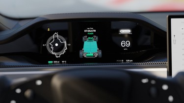 A view of the dashboard of a Tesla Model S in Plaid Track Mode