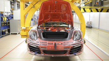 Workers assemble Porsche cars at the Zuffenhausen Porsche production plant on March 10, 2015 in Stuttgart, Germany.