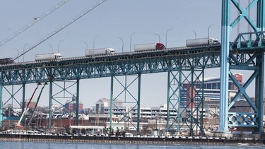 Trucks are shown on the Ambassador Bridge on Monday, Feb. 14, 2022.