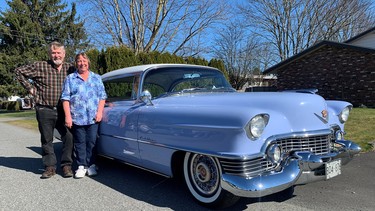 Stan and Colleen Strahl with the restored 1955 Cadillac Coupe de Ville they will drive both ways across Canada as part of the Canadian Coasters tour.