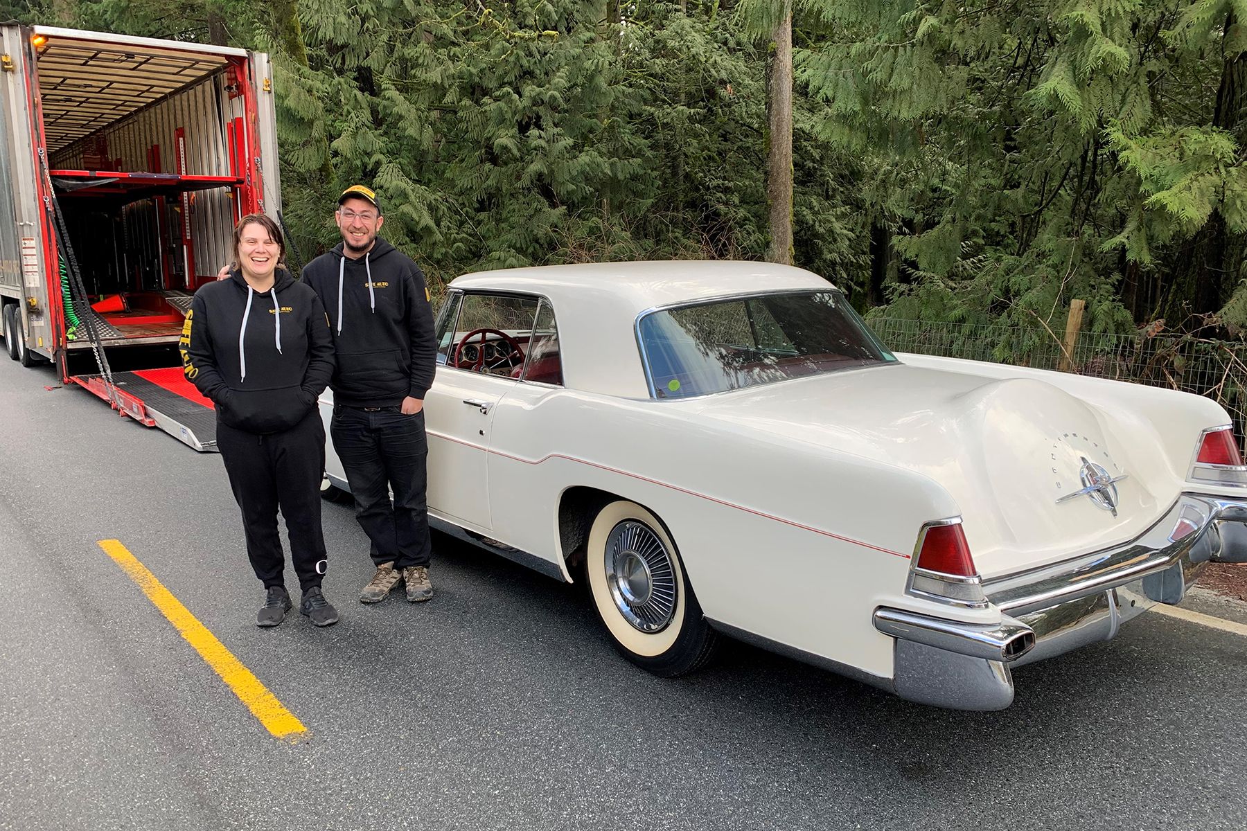 Car-moving couple criss-cross the continent