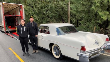 Christina Kelbert and Michael Bar about to load a 1956 Continental into their 80-foot-long car hauler for the trip from Vancouver to Toronto.